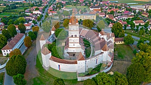 Sunset view of the Fortified Evangelical Church in Harman, Roman