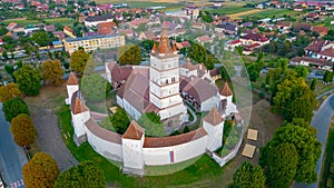 Sunset view of the Fortified Evangelical Church in Harman, Roman