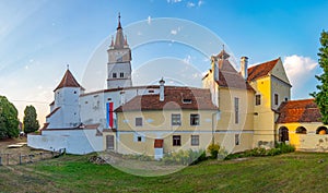 Sunset view of the Fortified Evangelical Church in Harman, Roman