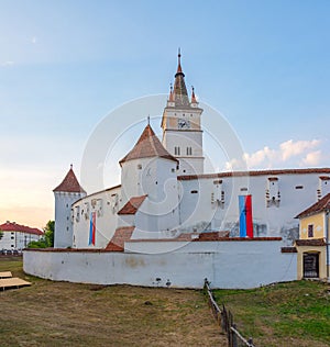 Sunset view of the Fortified Evangelical Church in Harman, Roman