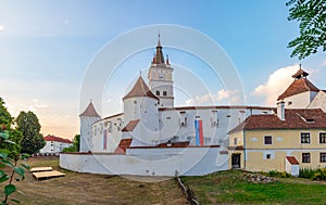 Sunset view of the Fortified Evangelical Church in Harman, Roman