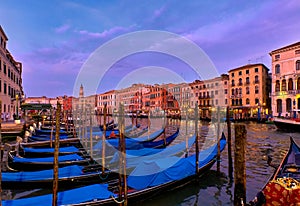 Sunset view of Grand Canal, Venice, Italy. UNESCO heritage city famous for its waterways and gondolas, beautiful sunset