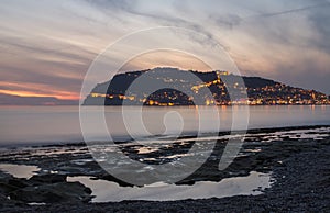 Sunset view of harbor, sea and fortress in Alanya, Turkey.