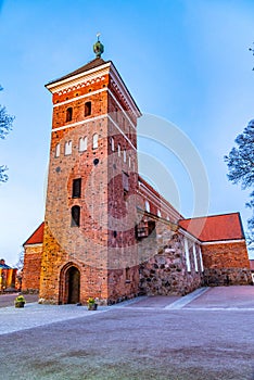 Sunset view of Helga Trefaldighets kyrka in Uppsala, Sweden photo