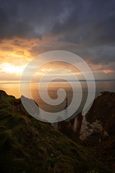 Sunset view of hite cliffs of Etretat and the Alabaster Coast, Normandy, France at sunset