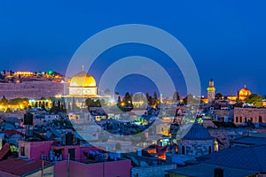 Sunset view of Jerusalem dominated by golden cupola of the dome of the rock, Israel