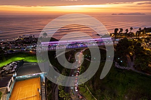 Sunset view from La Bajada de Balta in Miraflores, in the city of Lima photo