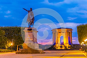 Sunset view of La Promenade du Peyrou dominated by the statue of king Louis XIV in Montpellier, France