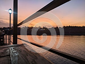 Sunset view of Lake San Roque from a balcony bar in Cordoba, Argentina