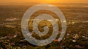 Sunset view of Mandalay on the top of the hill, Myanmar. photo