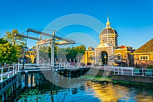 sunset view of Morspoort gate leading to the old town of Leiden, Netherlands