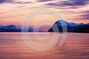 Sunset view of mountains in Molde, Norway in the evening at sunset photo