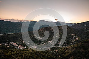 Sunset view of mountains and small villages in Sicily