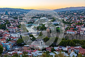 Sunset view of Narikala fortress overlooking downtown Tbilisi in