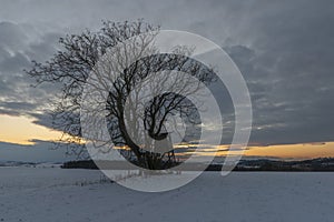 Sunset view near Celoznice village and Kyjov town in winter cold evening