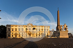 Sunset view of Obelisk and Palazzo della Consulta at Piazza del Quirinale in Rome, Italy