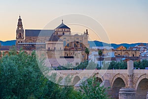 Sunset view of the old roman bridge in the spanish city cordoba