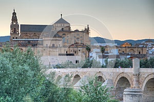 Sunset view of the old roman bridge in the spanish city cordoba