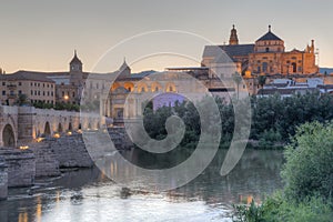 Sunset view of the old roman bridge in the spanish city cordoba