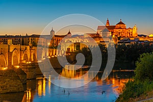 Sunset view of the old roman bridge in the spanish city cordoba