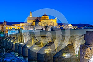 Sunset view of the old roman bridge in the spanish city cordoba