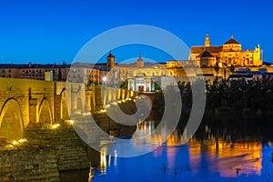 Sunset view of the old roman bridge in the spanish city cordoba