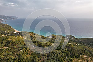 Sunset view over coast of Corfu with Glyfada beach, Greece