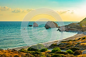 Sunset view over Petra tou Romiou alas Aphordite\'s rock on Cyprus