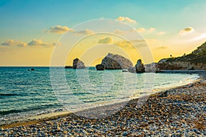 Sunset view over Petra tou Romiou alas Aphordite\'s rock on Cyprus