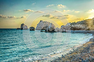 Sunset view over Petra tou Romiou alas Aphordite\'s rock on Cyprus