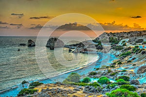 Sunset view over Petra tou Romiou alas Aphordite\'s rock on Cyprus