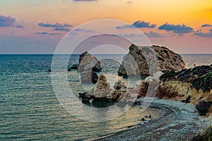 Sunset view over Petra tou Romiou alas Aphordite\'s rock on Cyprus