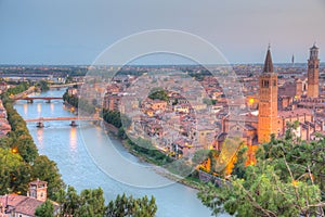 Sunset view of Ponte Pietra bridge in Verona, Italy