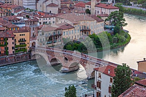 Sunset view of Ponte Pietra bridge in Verona, Italy