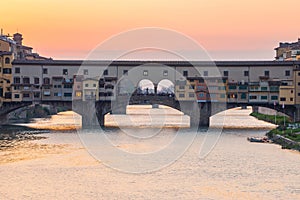 Sunset view at Ponte Vecchio bridge in Florence, Tuscany, Italy