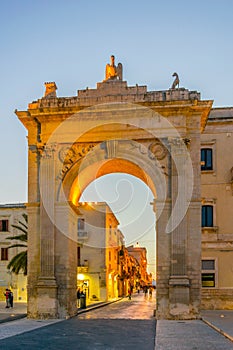 Sunset view of the Porta Reale o Ferdinandea in Noto, Sicily, Italy photo