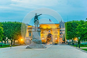 Sunset view of the Promenade du Peyrou dominated by the statue of king Louis XIV and arc de triomphe in Montpellier, France