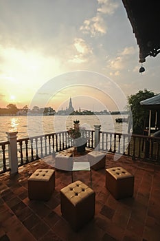 Sunset view from riverside cafe near the Dawn temple Bangkok riv