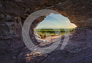 Sunset view through the rock. Arenite hole, in Jalapao, Brazil. Pedra furada.