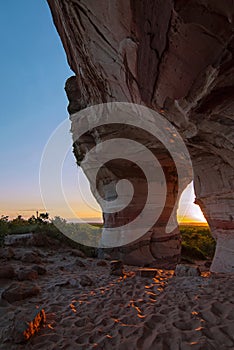 Sunset view through the rock. Arenite hole, in Jalapao, Brazil. Pedra furada.