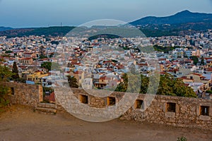 Sunset view of rooftops of Greek town Rethimno at Crete island