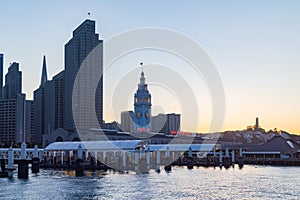 Sunset view of the San Francisco skyline from Pier 14