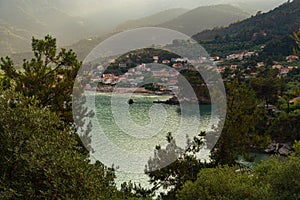 Sunset view of Skala Potamia, Golden beach, the Aegean sea and mountains, Thassos, Greece