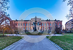 Sunset view of Statue of Erik Gustaf Geijer in front of the university of Uppsala in Sweden