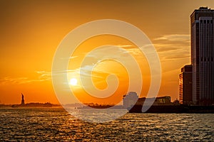 Sunset view of Statue of Liberty in New York City, USA