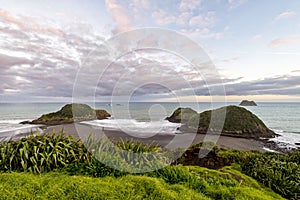 Sunset view of Sugar Loaf Islands, New Plymouth, New Zealand