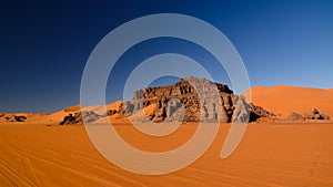 Sunset view to Tin Merzouga dune at Tassili nAjjer national park, Algeria