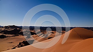 Sunset view to Tin Merzouga dune at Tassili nAjjer national park in Algeria