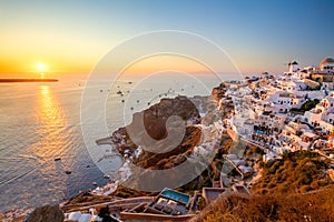 Sunset view of traditional Greek village Oia on Santorini island in Greece