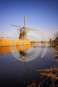 Sunset view at typical windmill at Kinderdijk, Holland.